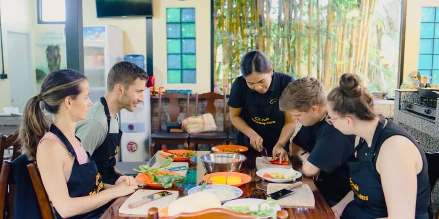 Khao Lak Pui's Authentic Thai Cooking Class - Hands-On Spring Rolls and Cooking on Gas Hobs