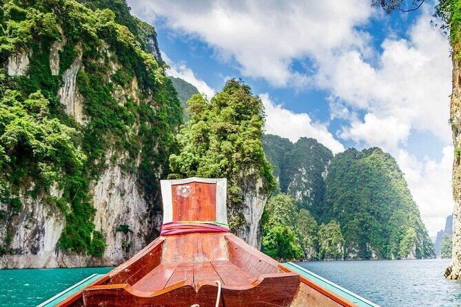 Khao Sok: Full Day Bamboo Rafting Tour from Khao Lak - Bamboo rafting on the Khao Sok River: quiet boats, limestone views