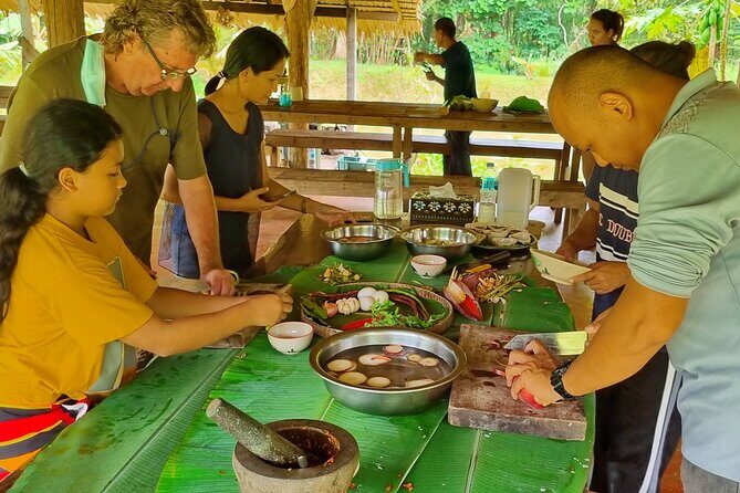 Khao Sok Local Life Adventure & Traditional Cooking Class - Sok River bamboo rafting: slow views at limestone-cliff pace